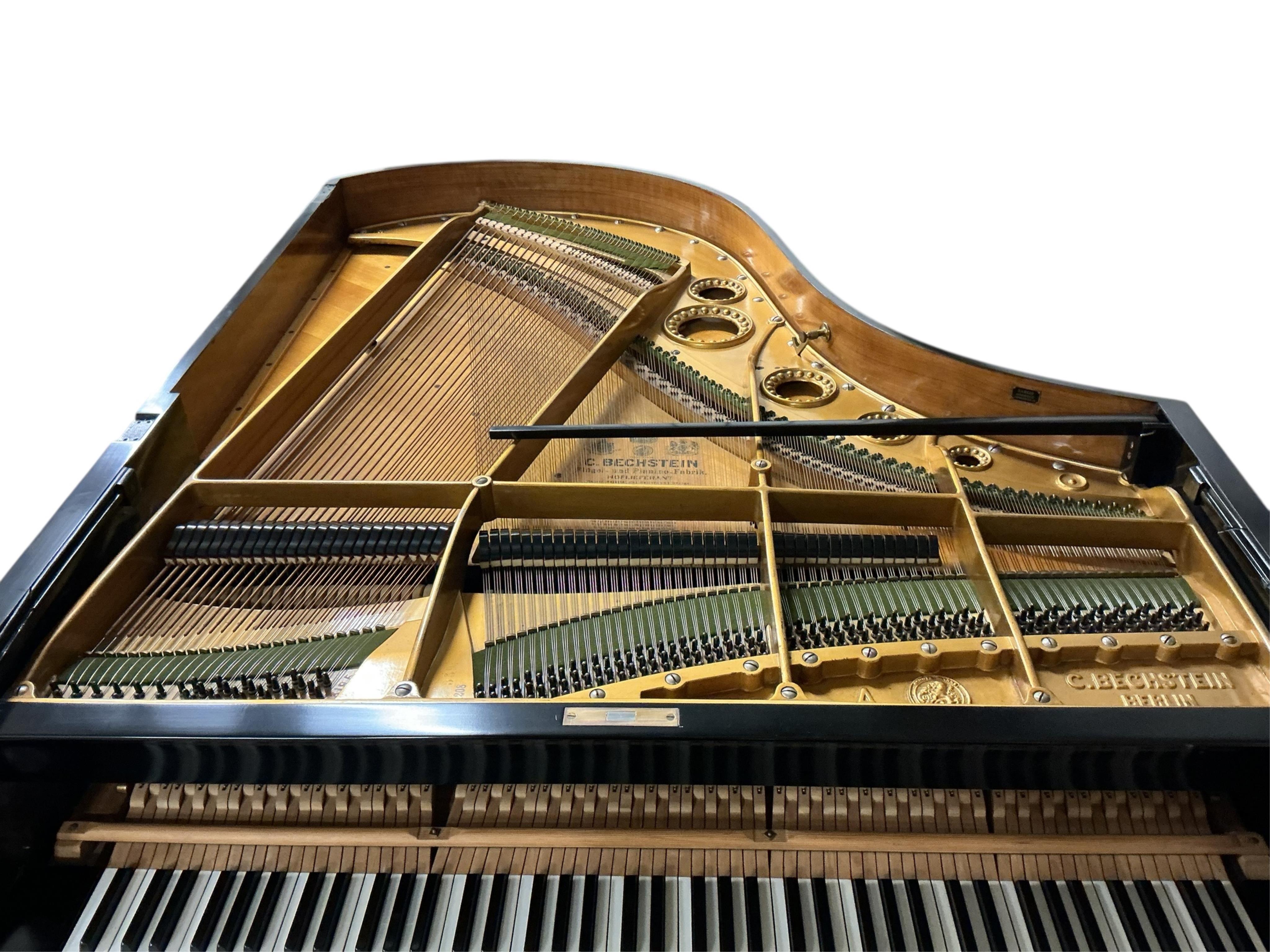 A Bechstein Model ‘A’ ebonised 5ft 8 baby grand piano c.1912, Serial no 105359 1208, retailed by Barker, London CITES Submission reference L3G698EY